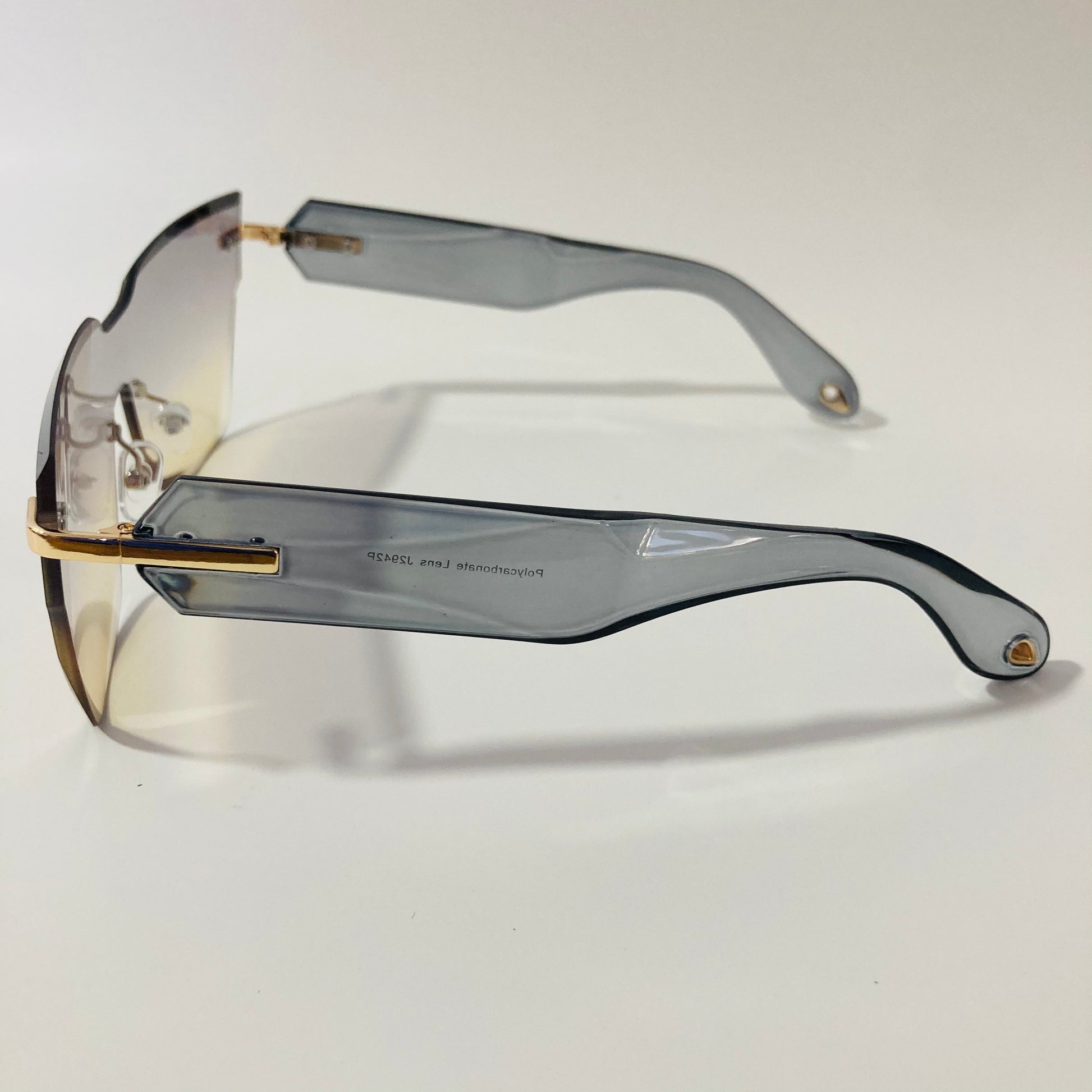 womens gray and yellow square rimless sunglasses
