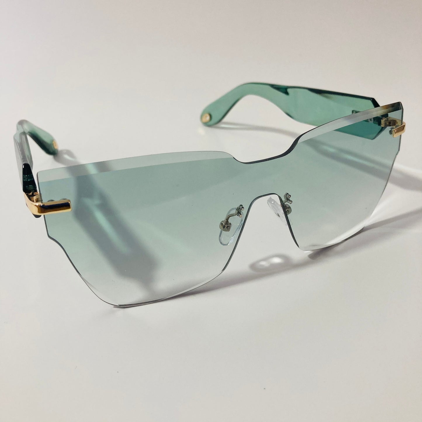 womens green square rimless sunglasses