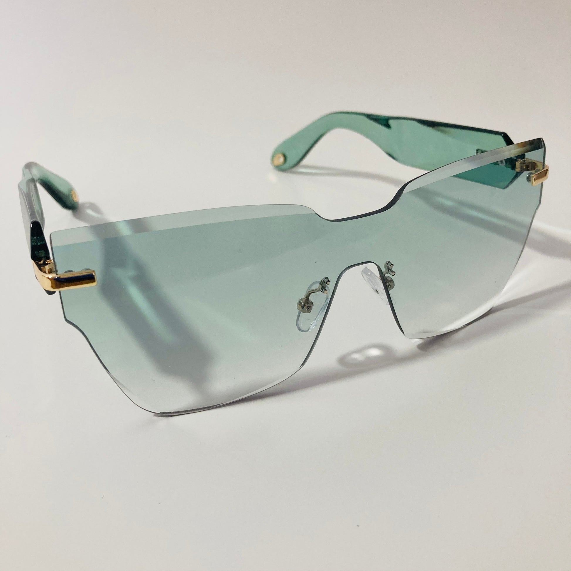 womens green square rimless sunglasses