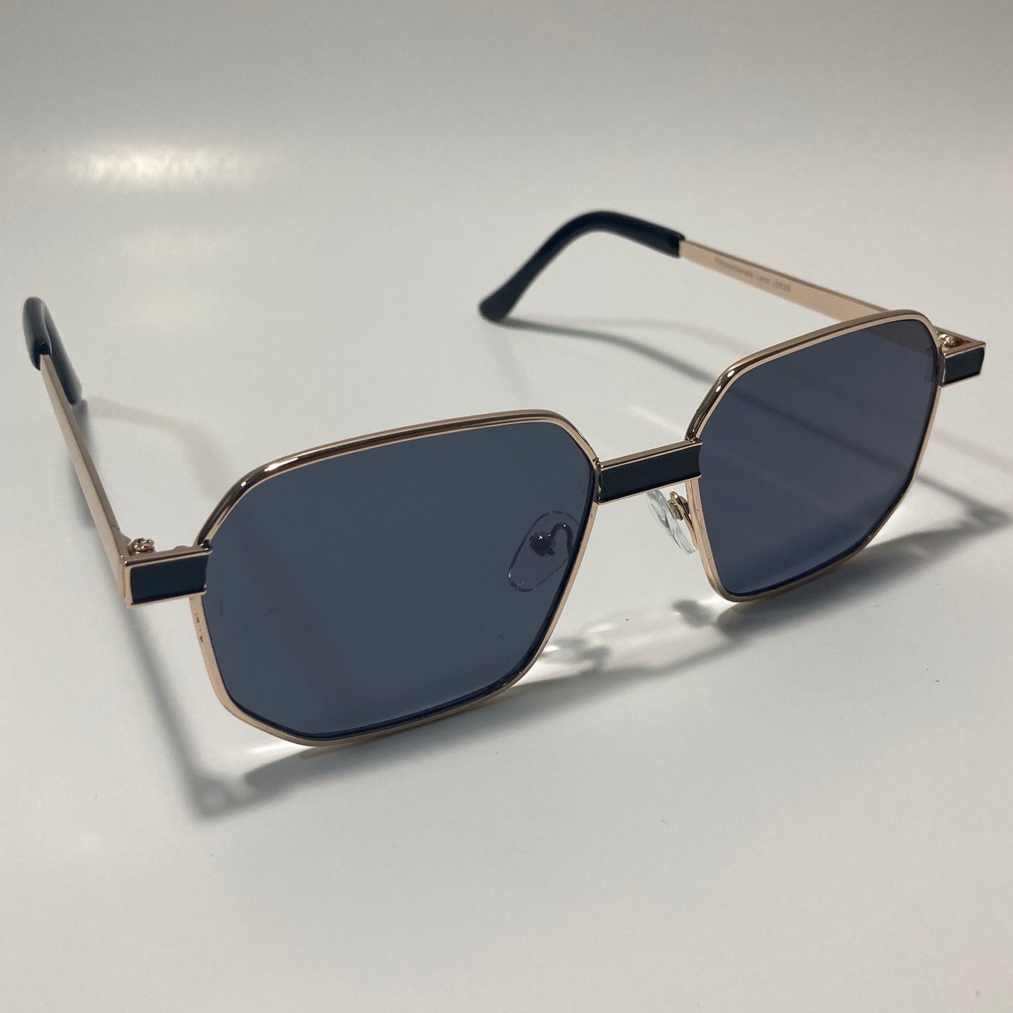 mens and womens black and gold square sunglasses