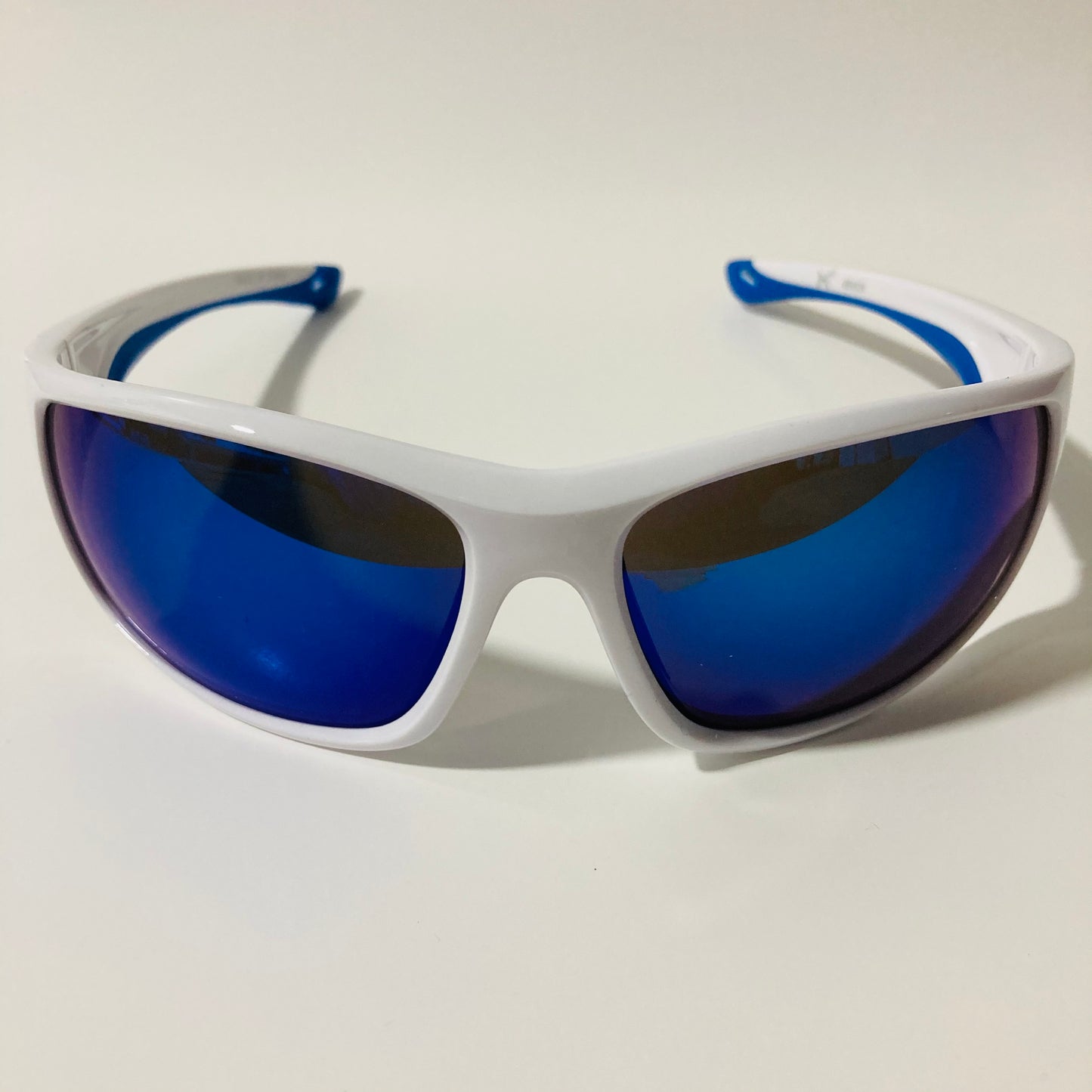 white and blue polarized wrap around sunglasses