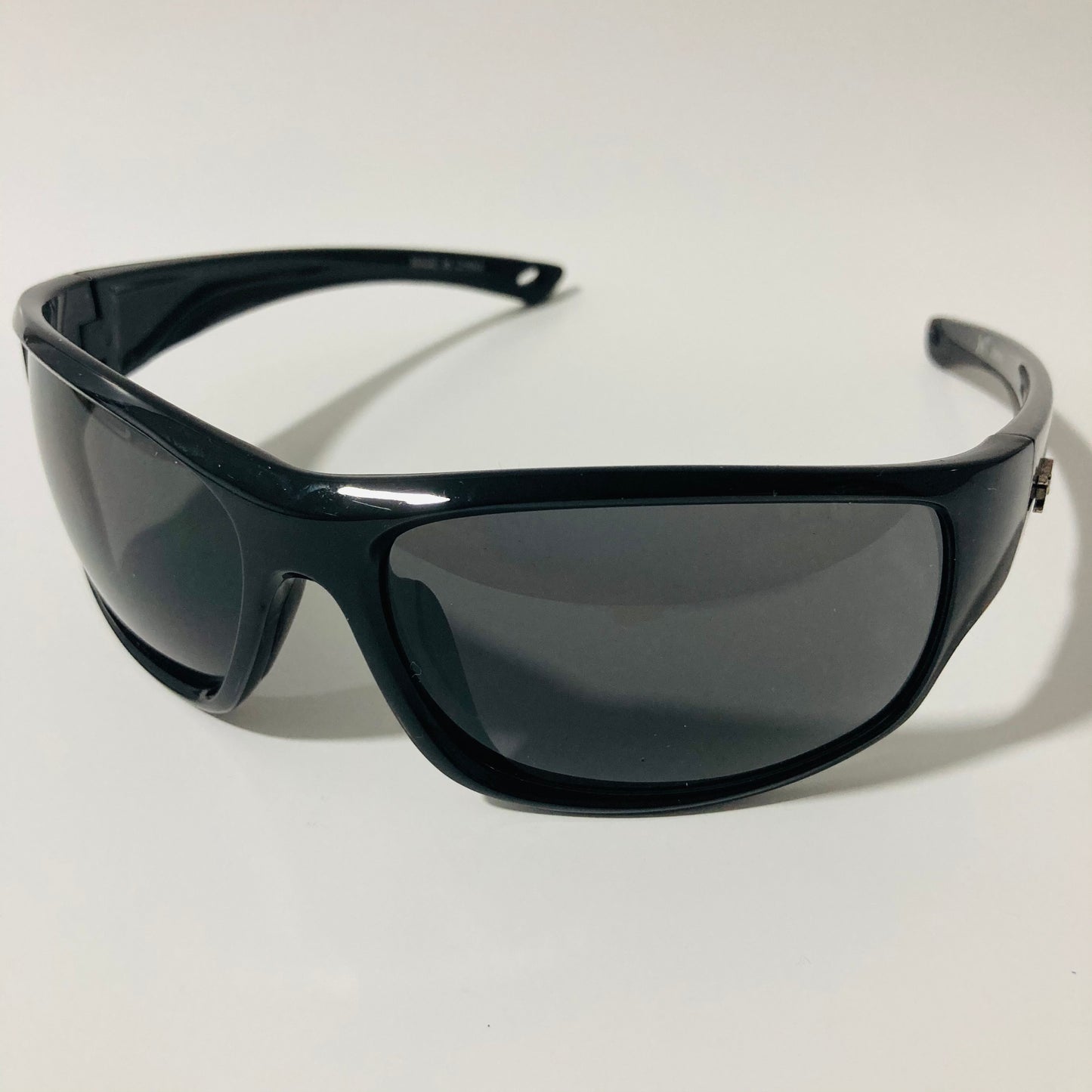 black polarized wrap around sunglasses