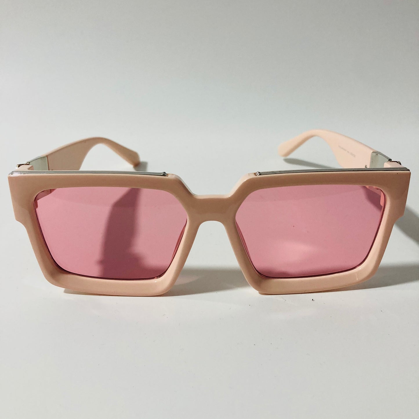 mens and womens pink square sunglasses with silver accents