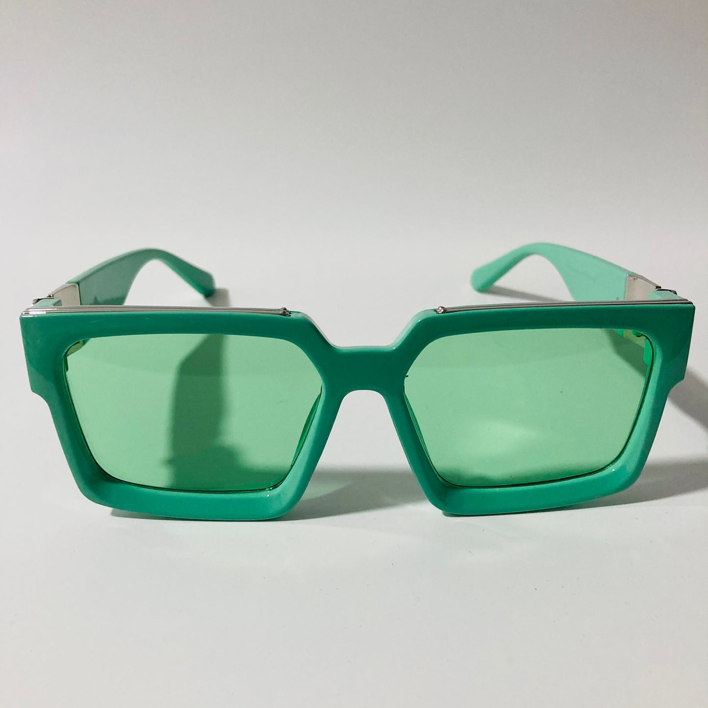 mens and womens green square sunglasses with silver accents