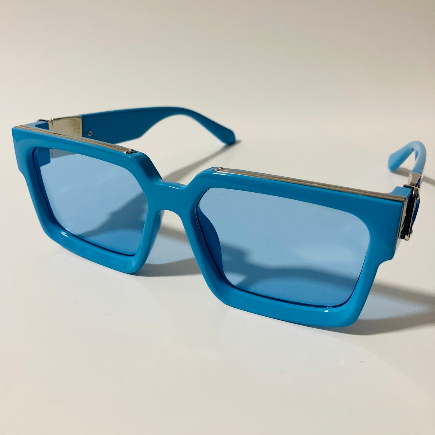 mens and womens blue square sunglasses with silver accents