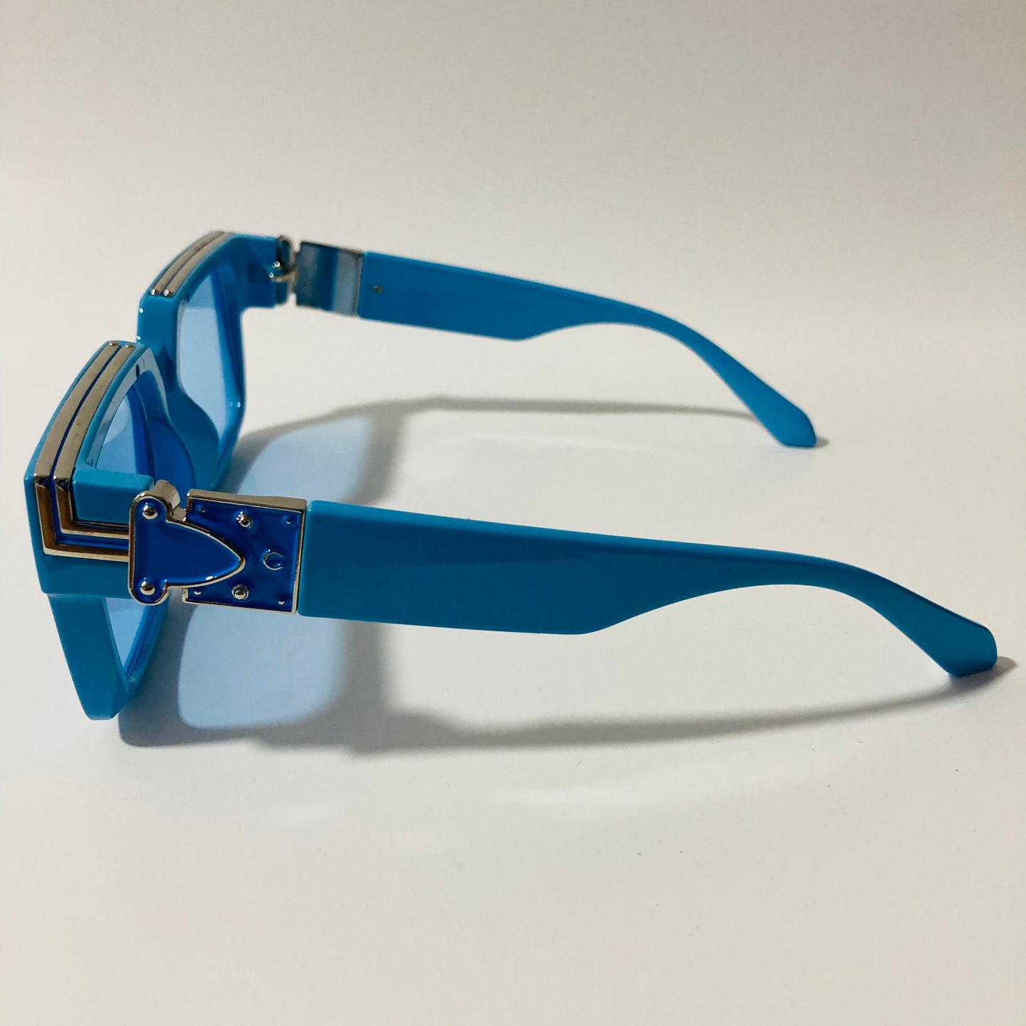 mens and womens blue square sunglasses with silver accents