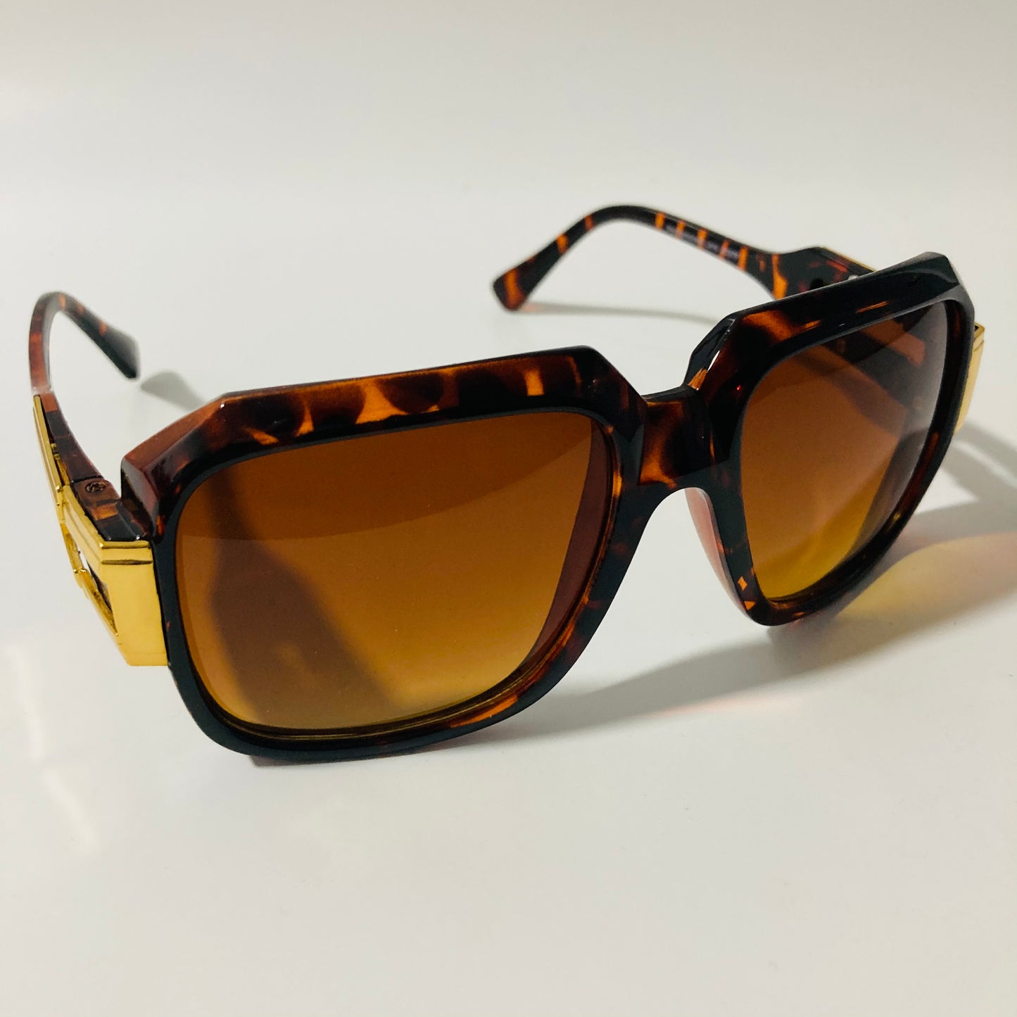 mens and womens brown and gold gazelle sunglasses