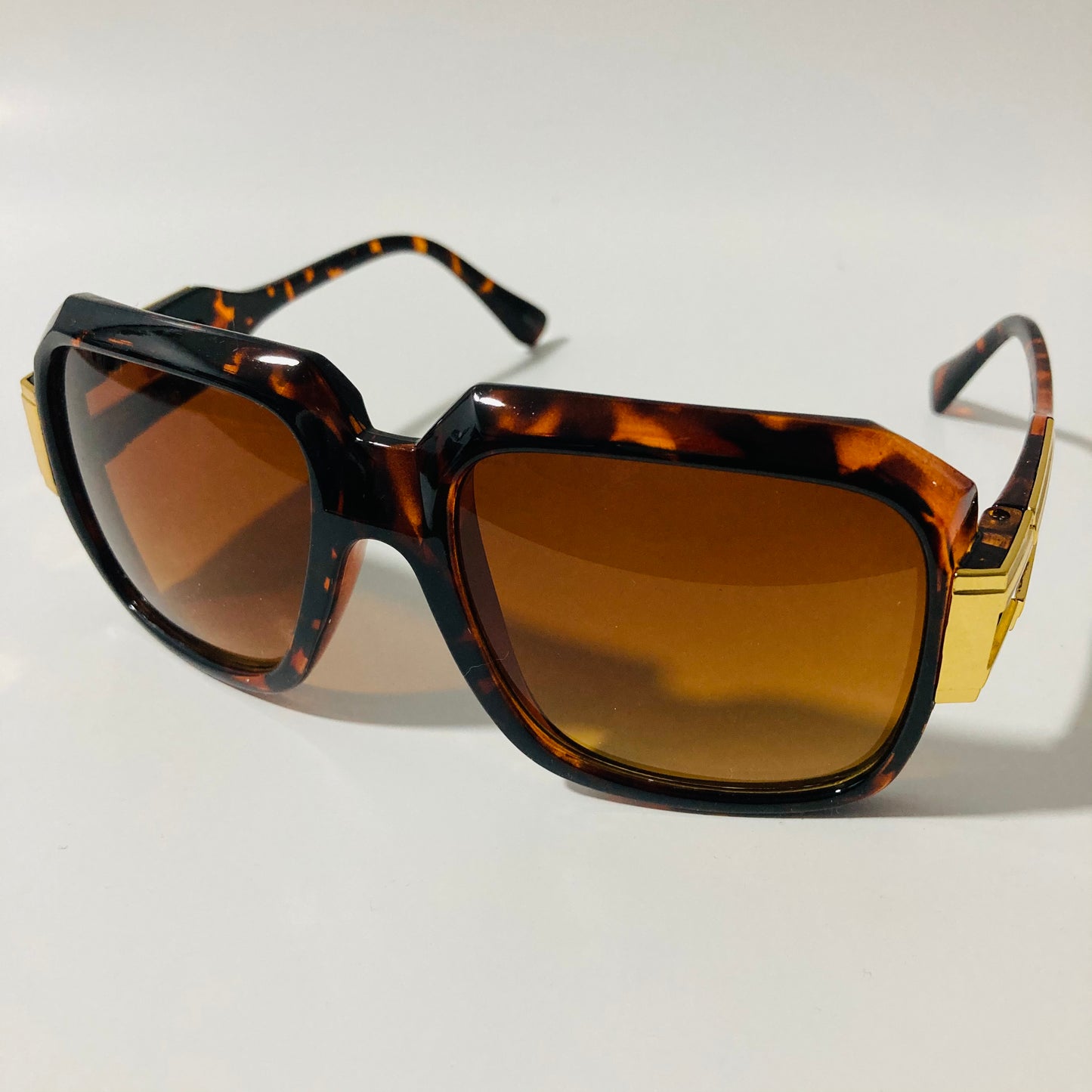 mens and womens brown and gold gazelle sunglasses