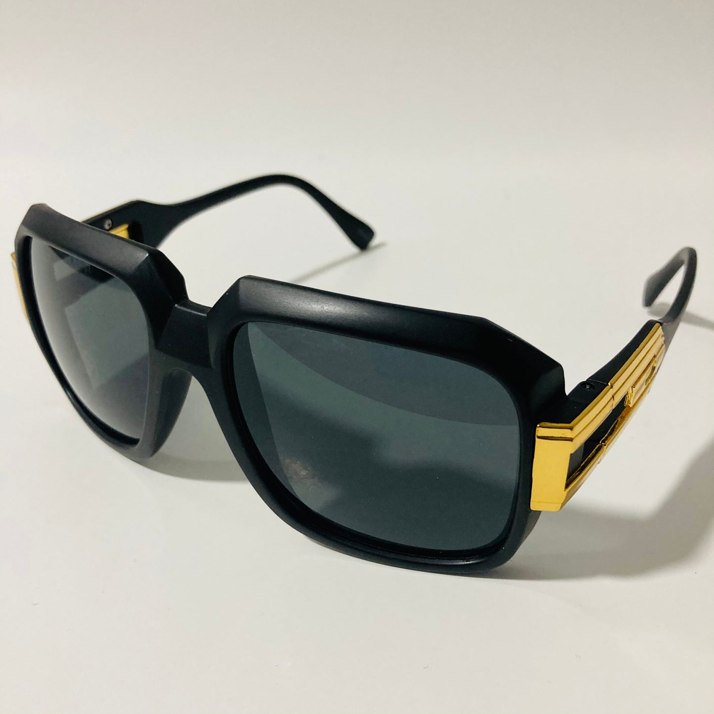 mens and womens black and gold gazelle sunglasses
