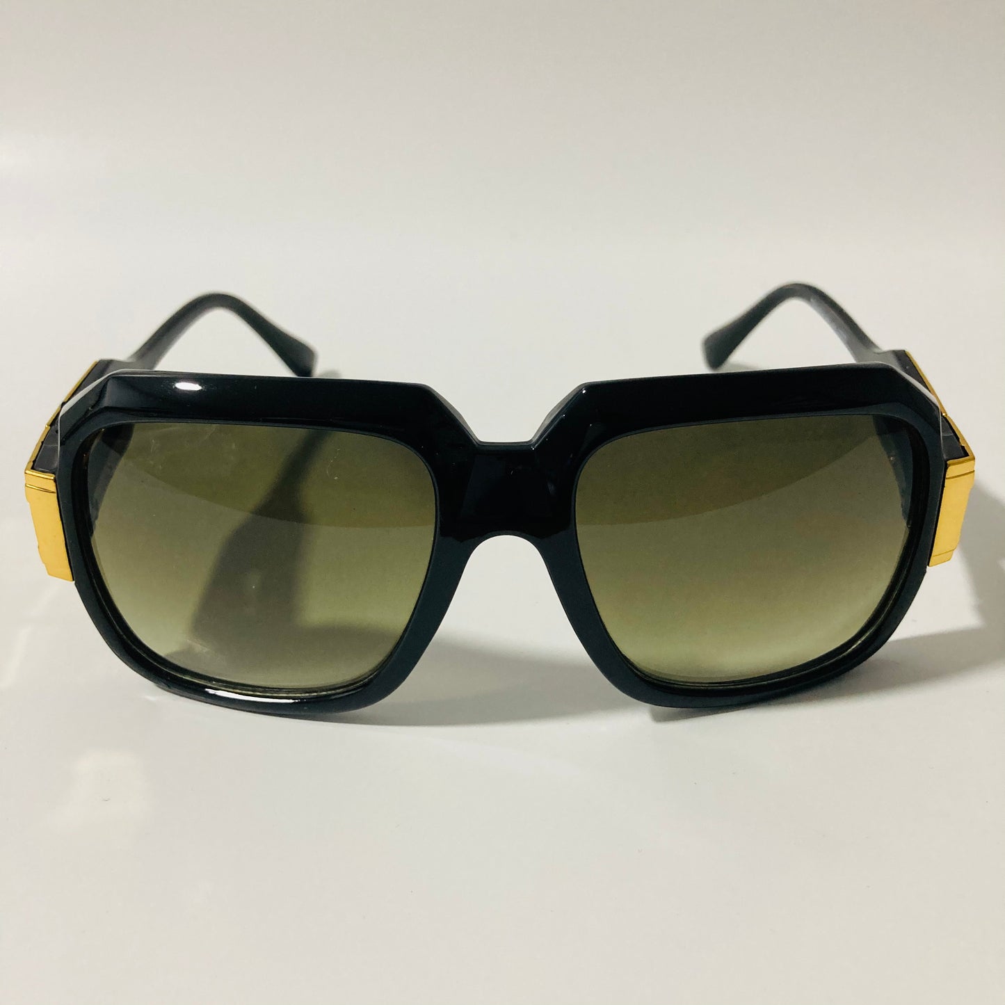 mens and womens black green and gold gazelle sunglasses