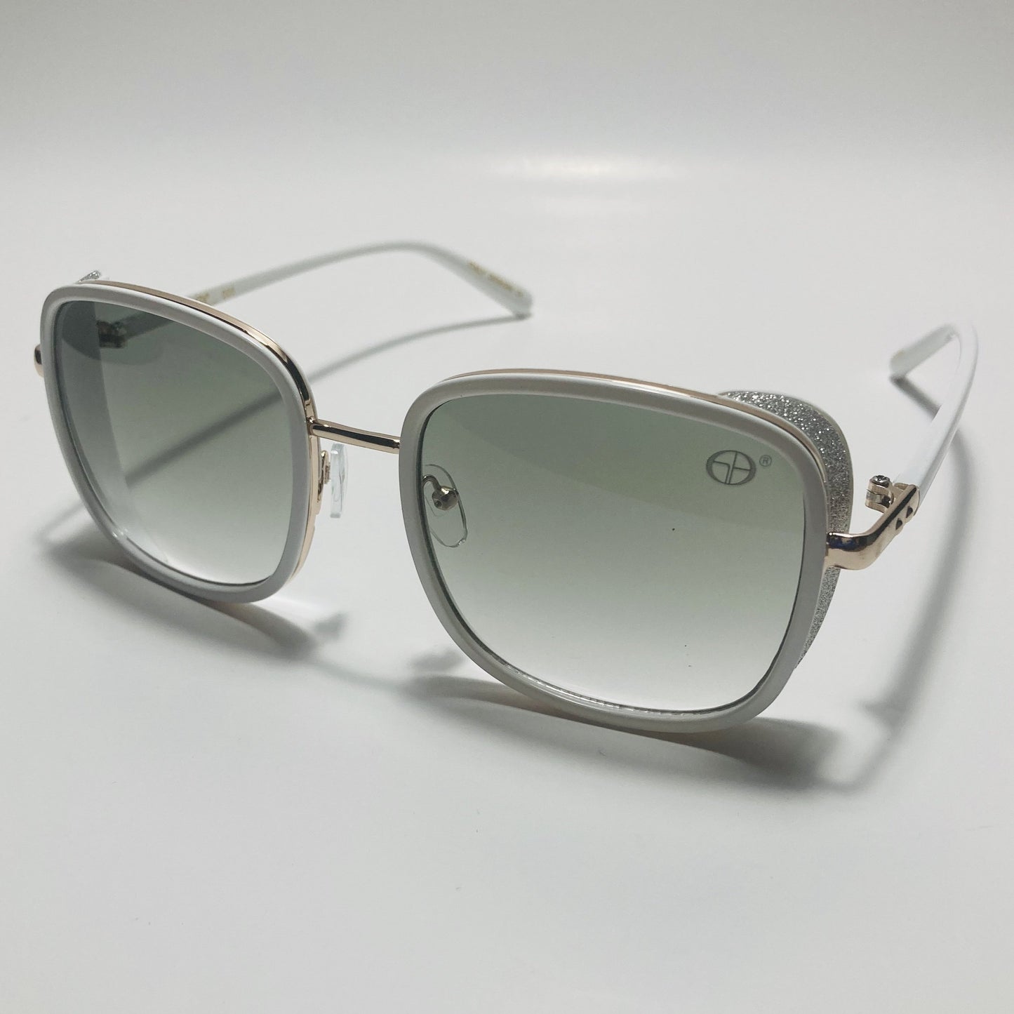 white and green elton john sunglasses