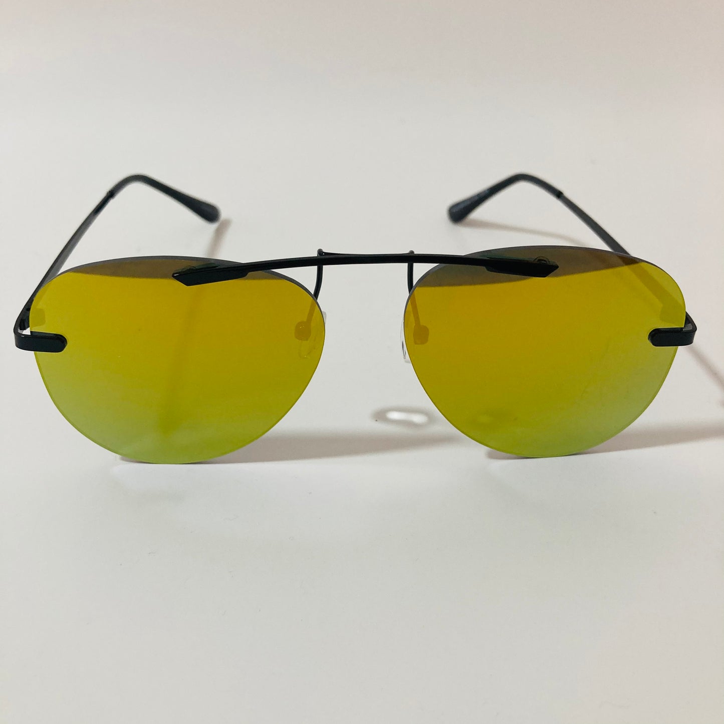 black rimless aviator sunglasses with yellow mirror lenses