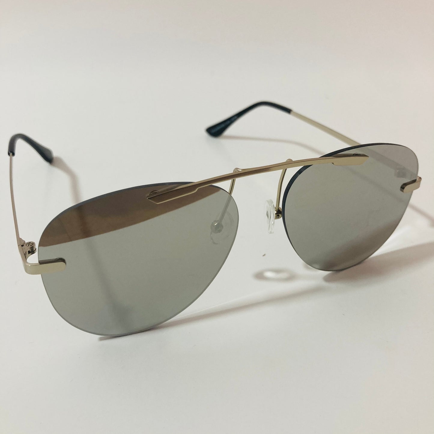 silver rimless aviator sunglasses with silver mirror lenses