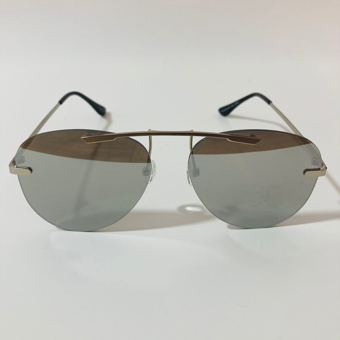 silver rimless aviator sunglasses with silver mirror lenses
