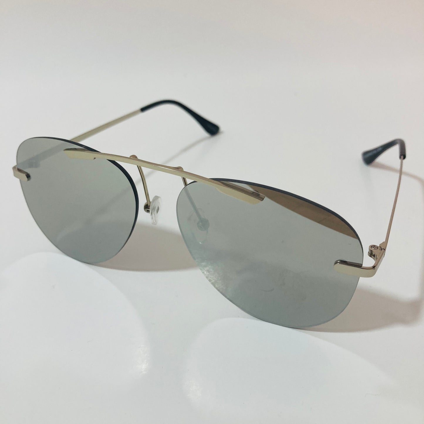 silver rimless aviator sunglasses with silver mirror lenses