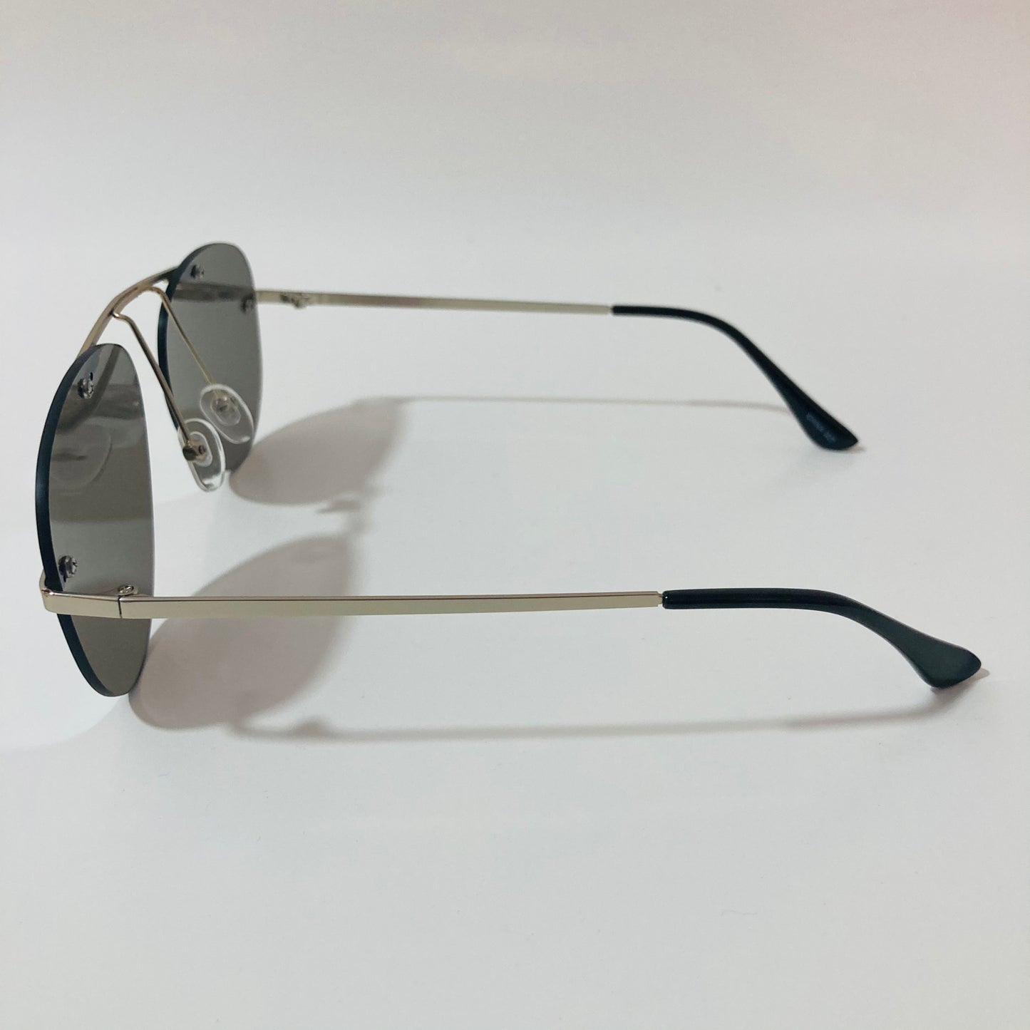 silver rimless aviator sunglasses with silver mirror lenses
