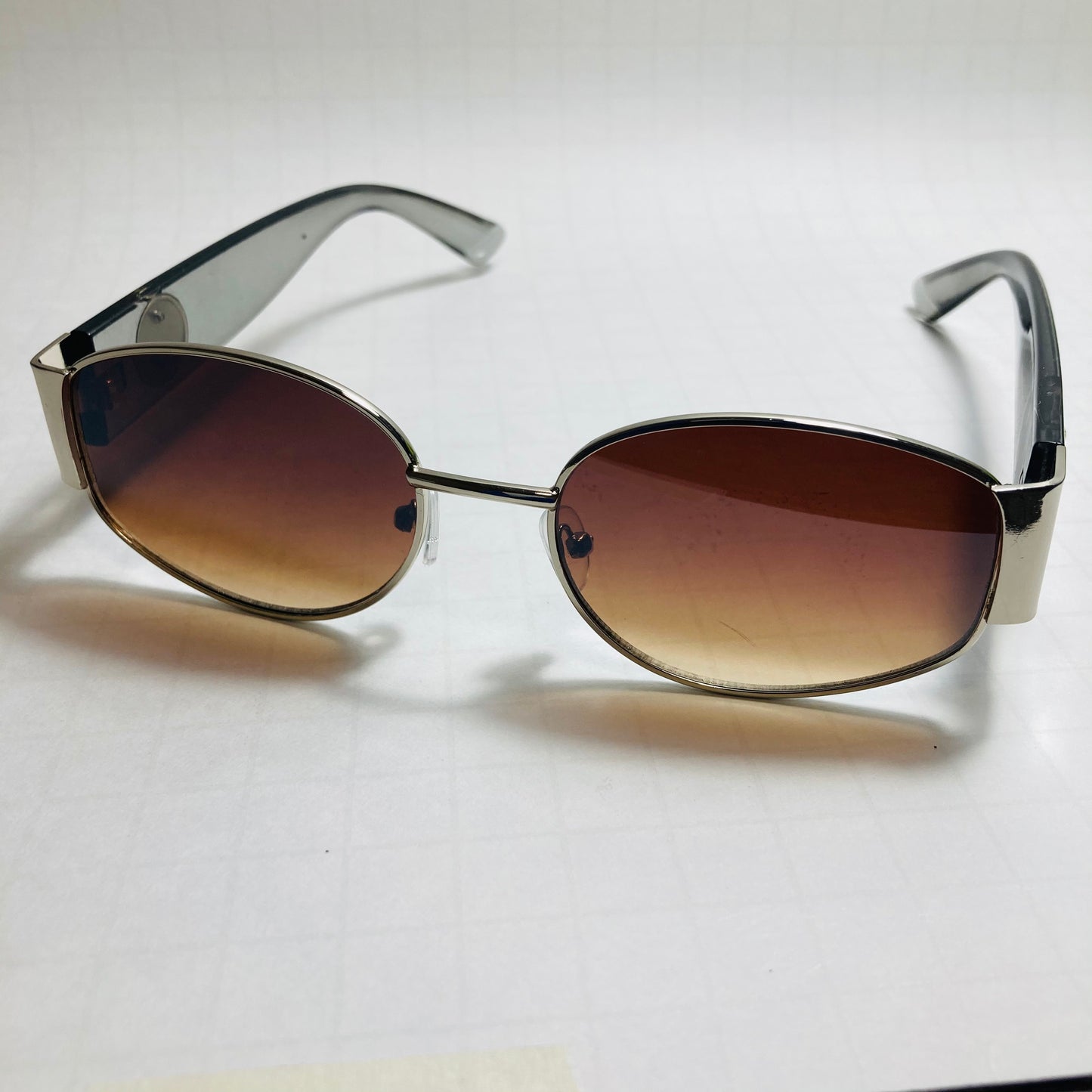 mens and womens gray and brown round sunglasses