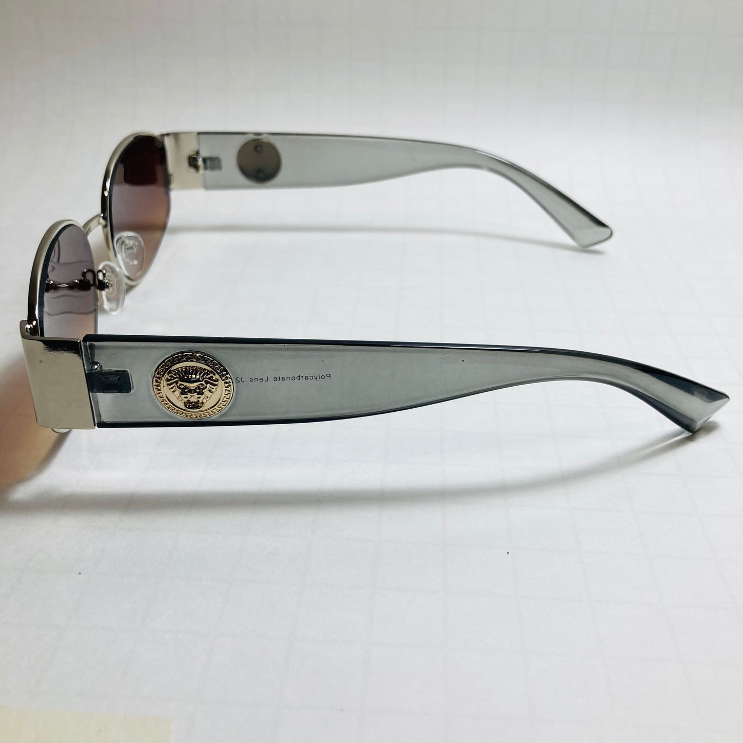 mens and womens gray and brown round sunglasses