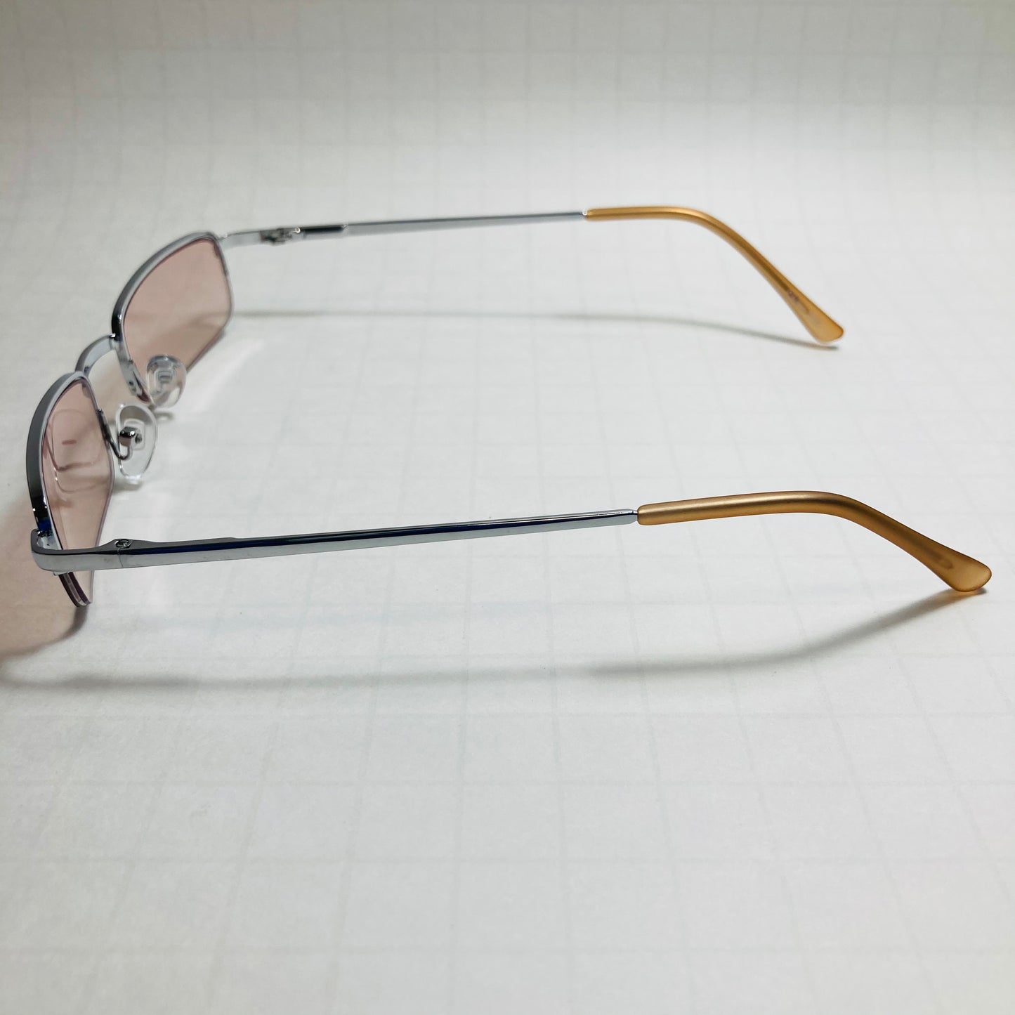 mens and womens silver and pink small square sunglasses