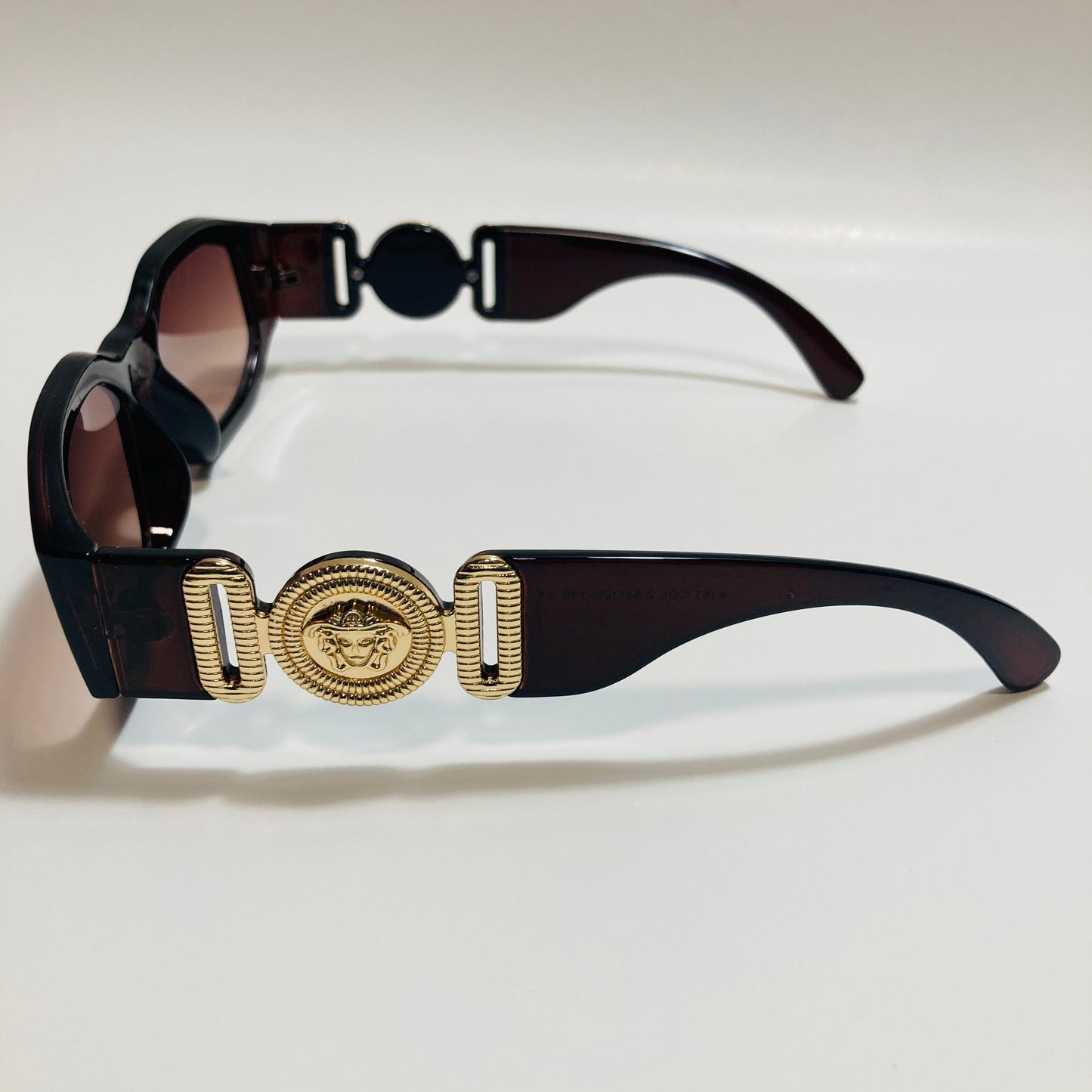 mens and womens brown and gold biggie sunglasses