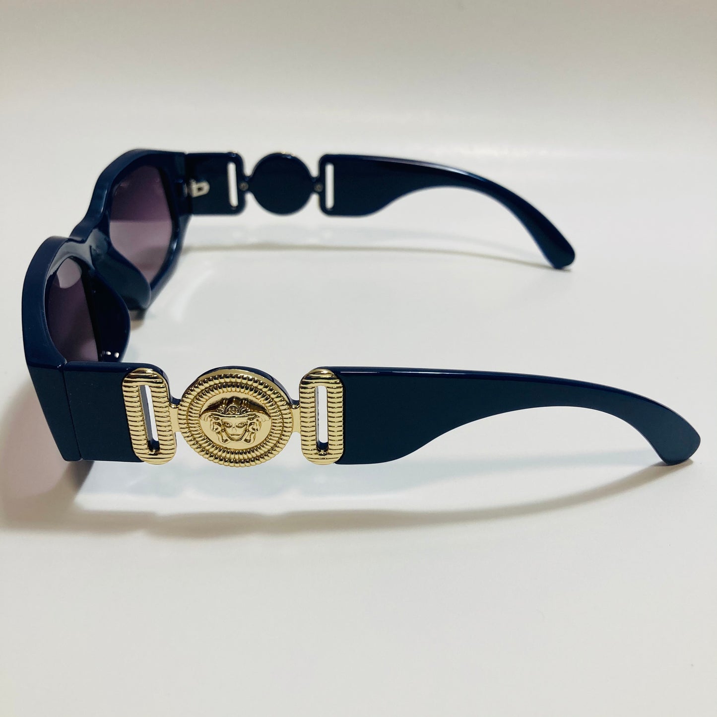 mens and womens blue and gold biggie sunglasses