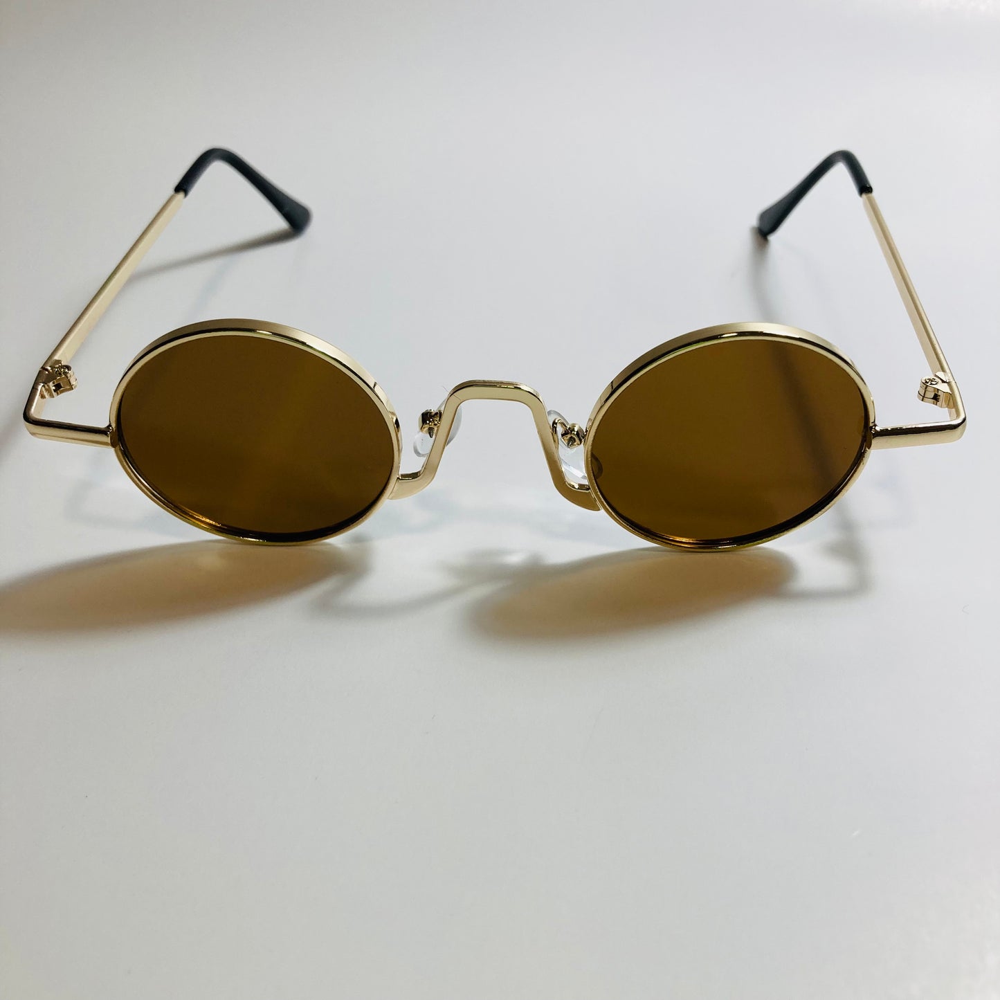 womens and mens gold and brown ozzy osbourne sunglasses