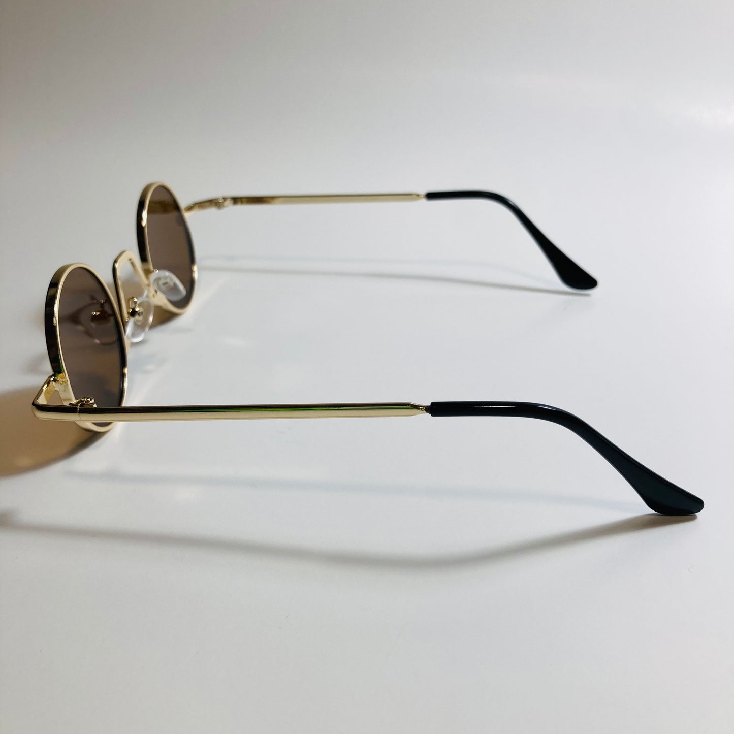 womens and mens gold and brown ozzy osbourne sunglasses