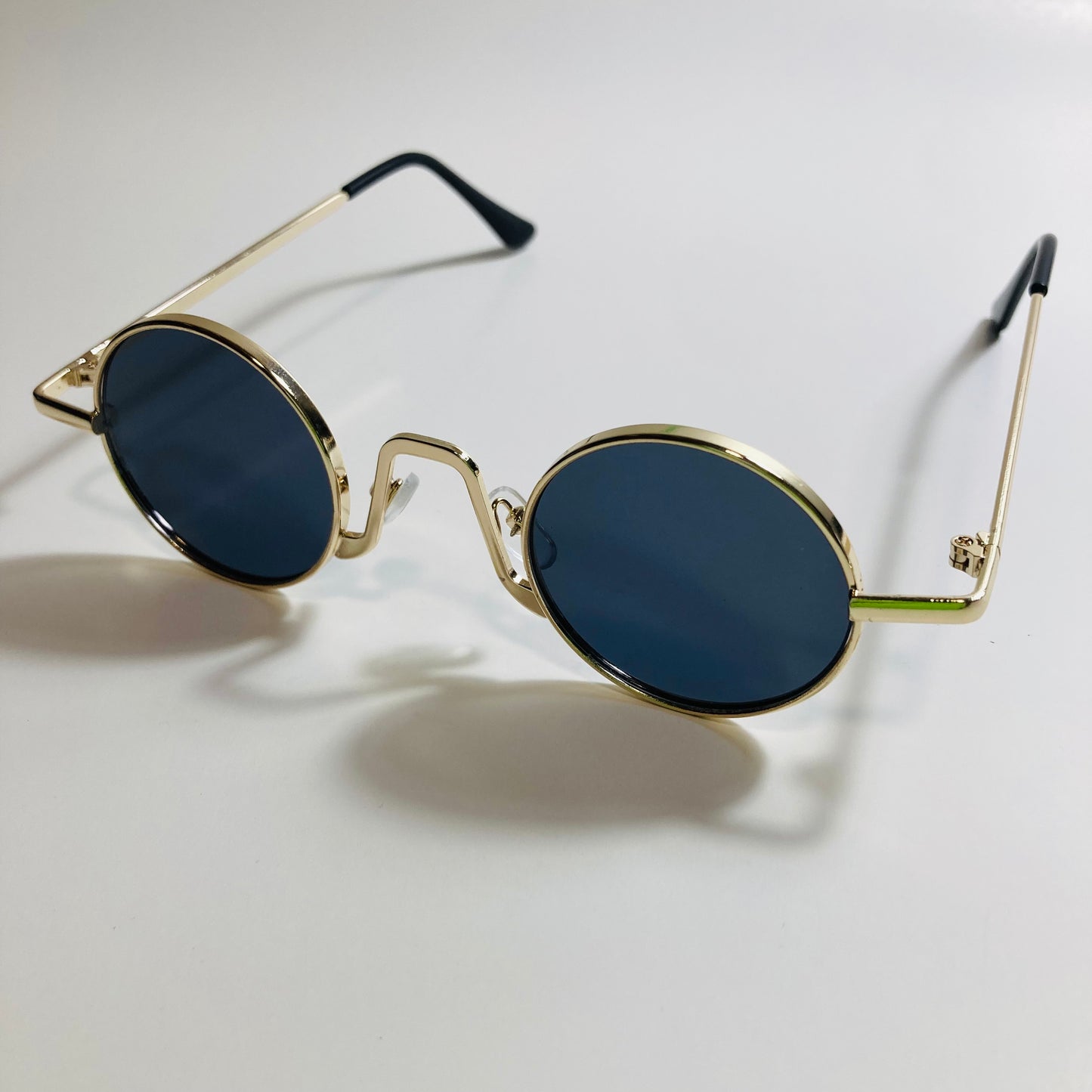 womens and mens gold and black ozzy osbourne sunglasses