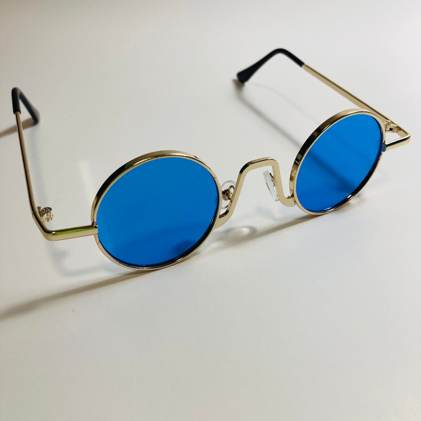 womens and mens gold and blue ozzy osbourne sunglasses