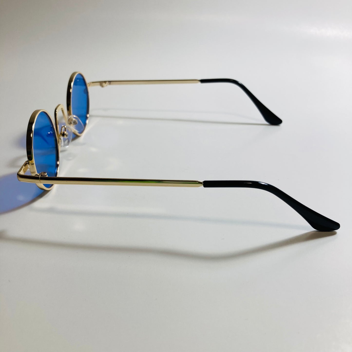 womens and mens gold and blue ozzy osbourne sunglasses