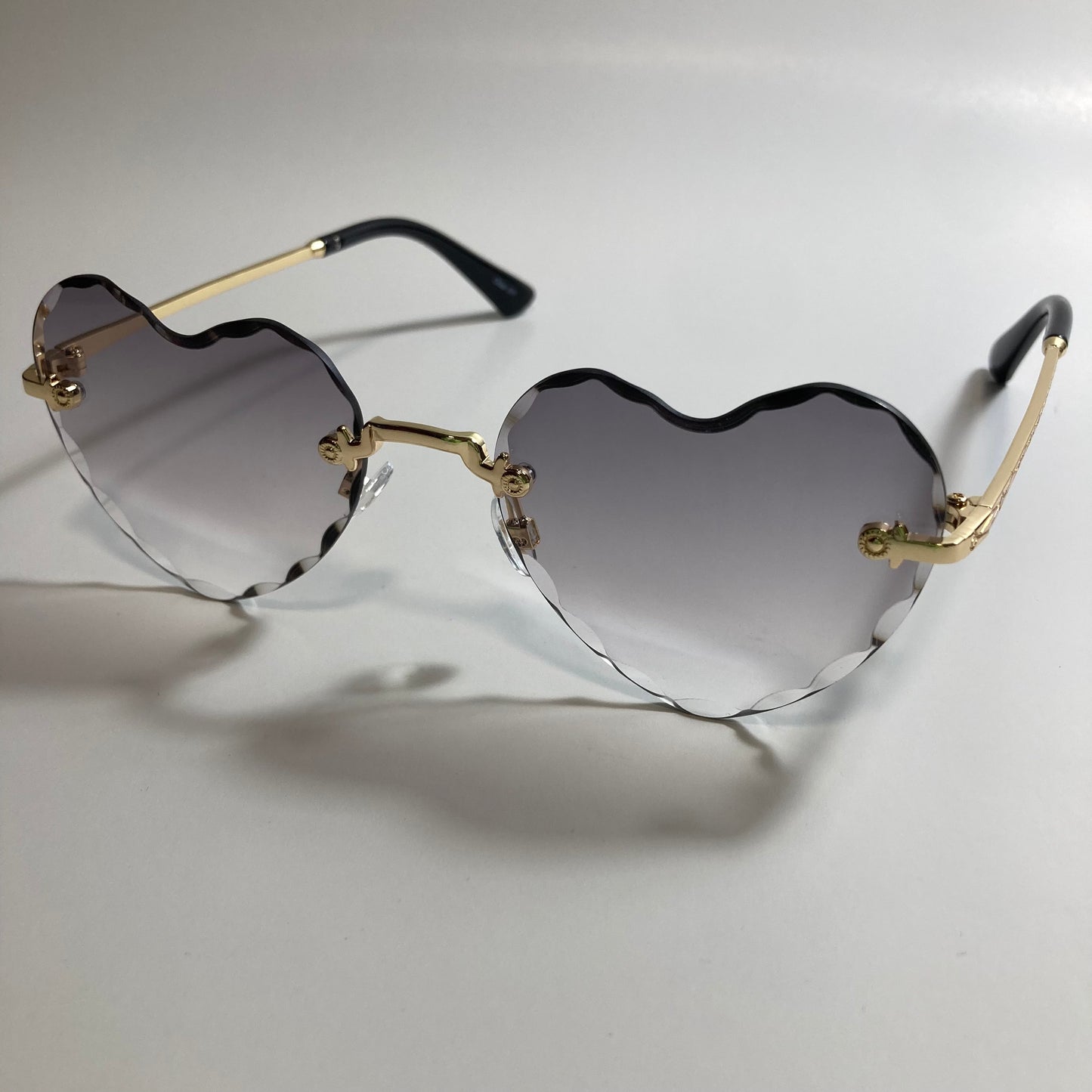 womens gold and black heart shape sunglasses
