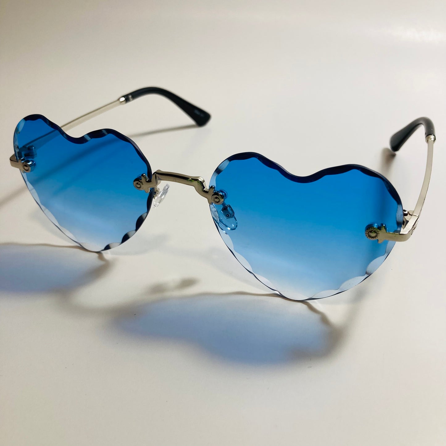 womens silver and blue heart shape sunglasses