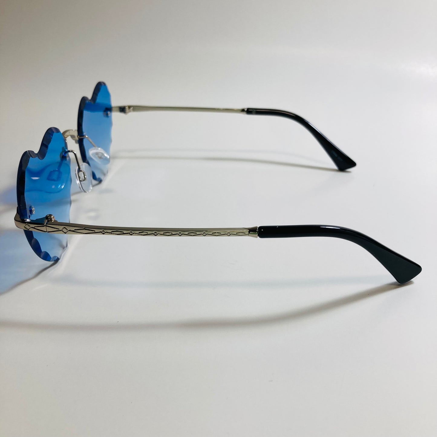 womens silver and blue heart shape sunglasses