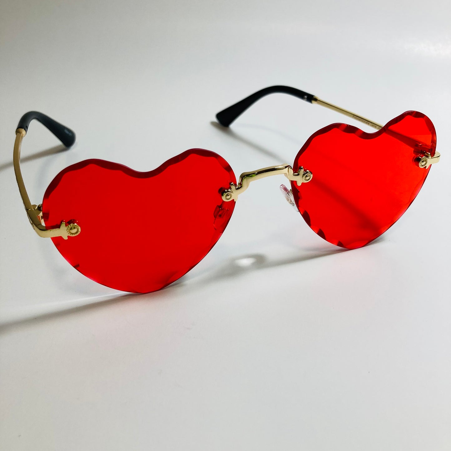 womens gold and red heart shape sunglasses