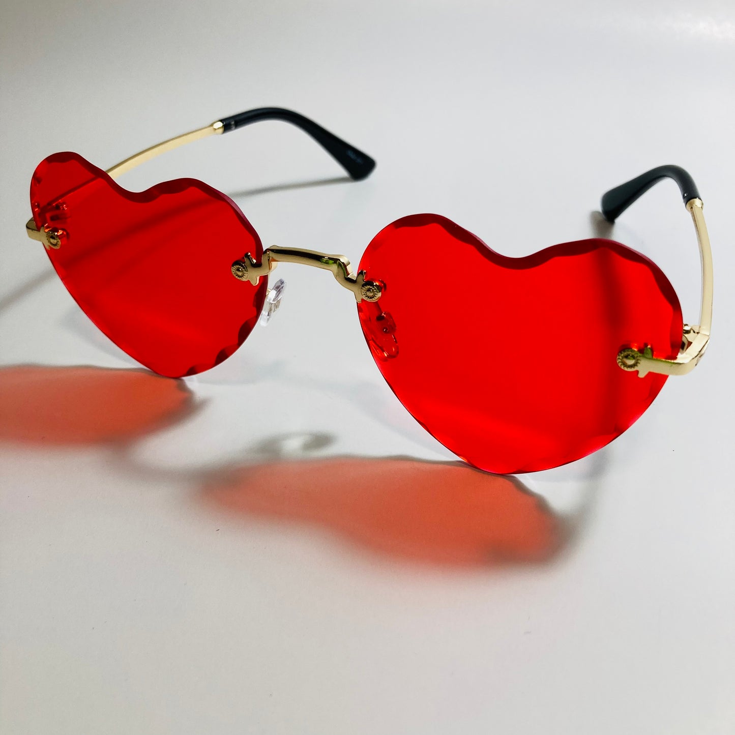 womens gold and red heart shape sunglasses
