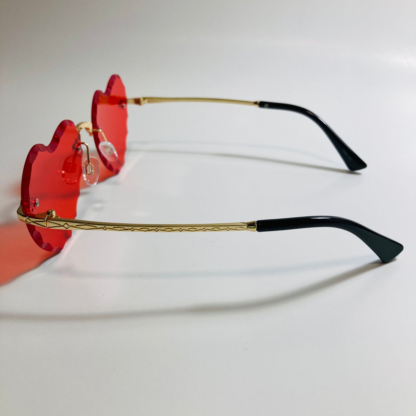 womens gold and red heart shape sunglasses