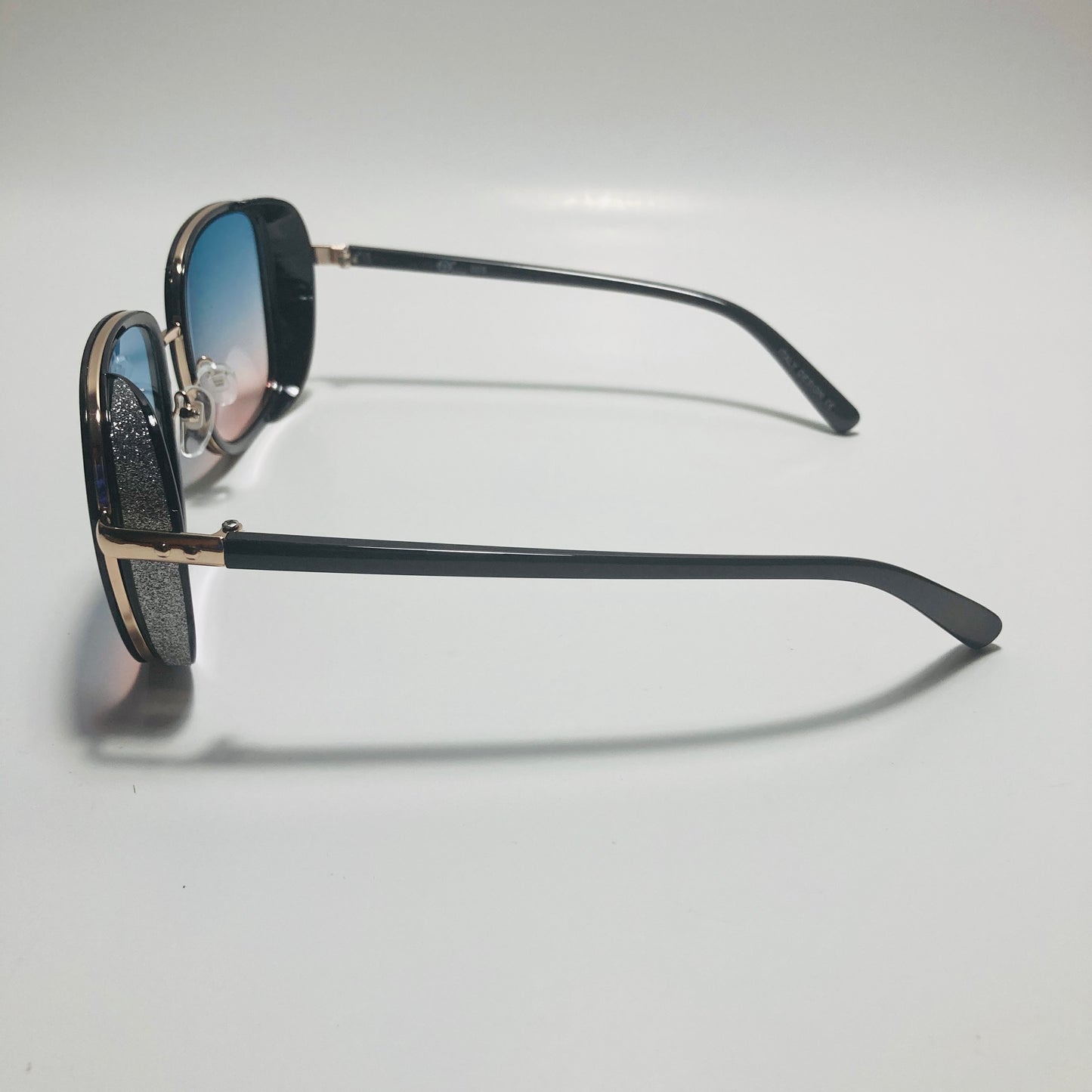 pink and blue elton john sunglasses