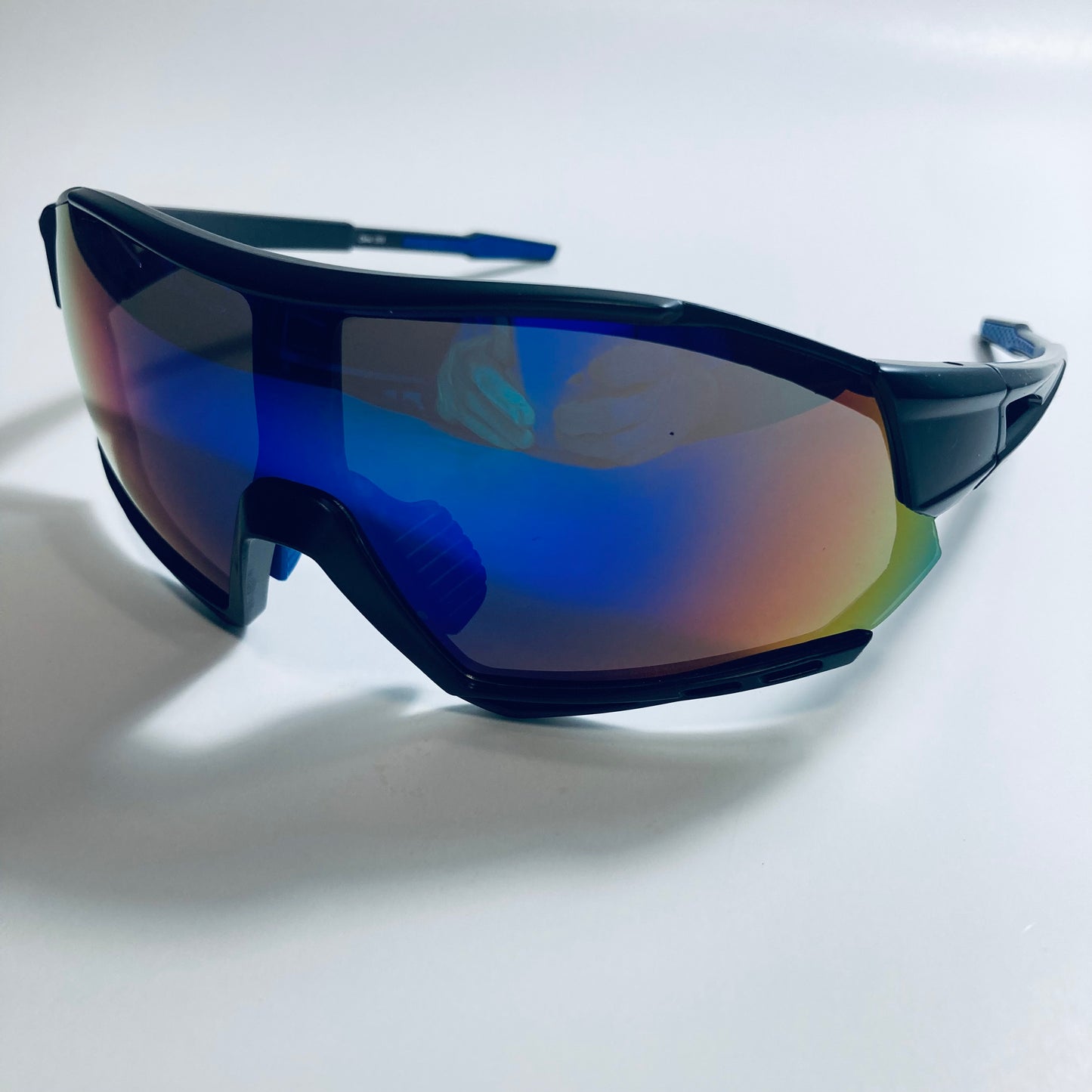 mens black oversize shield sunglasses with blue mirror lenses