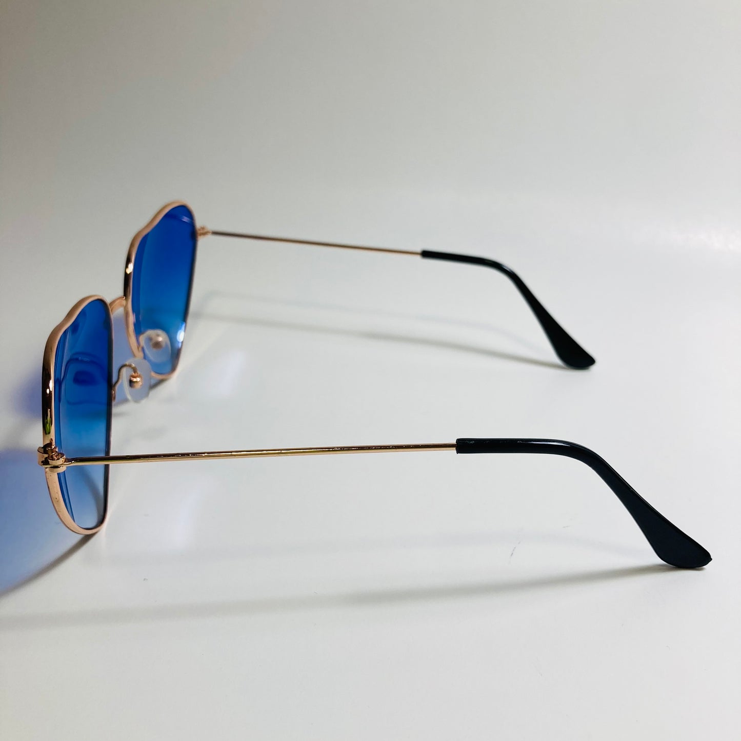 womens gold and blue heart shape sunglasses