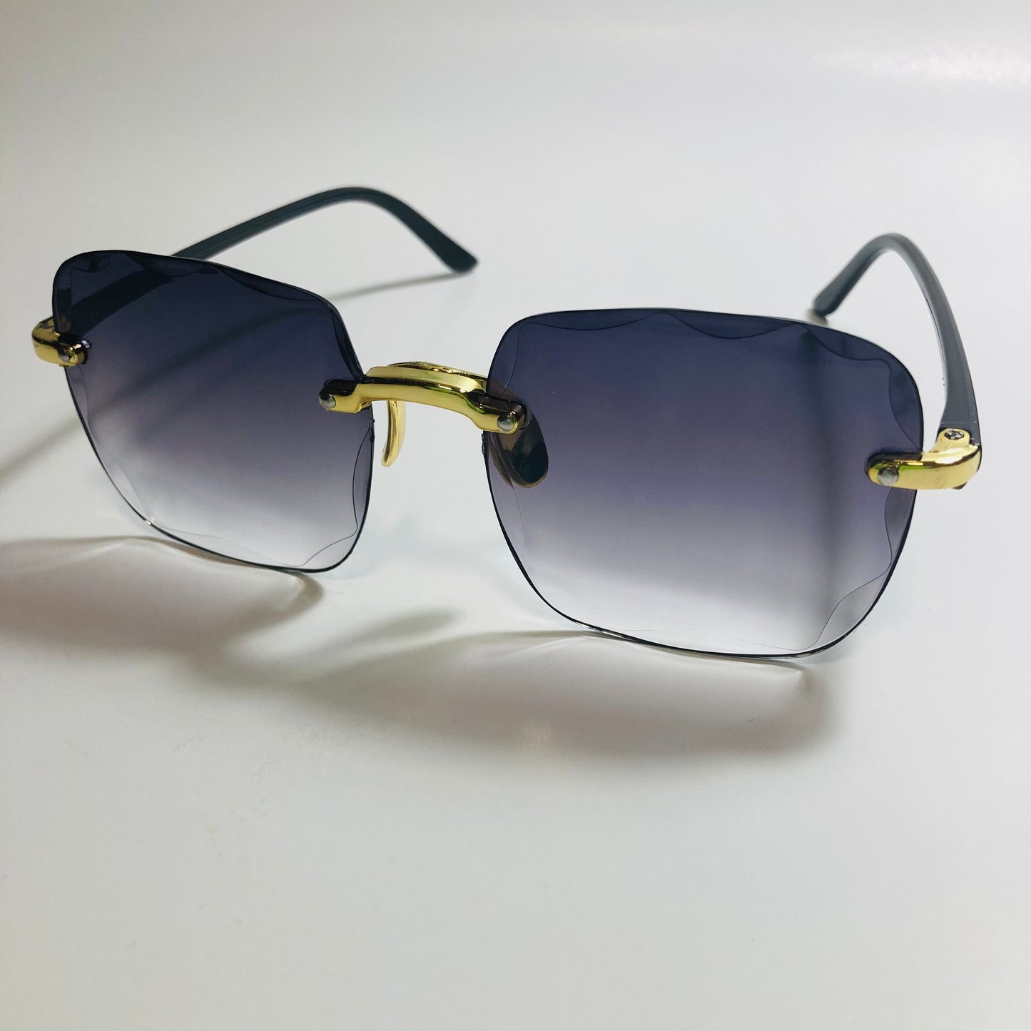womens rimless gold square oversize sunglasses with black lenses