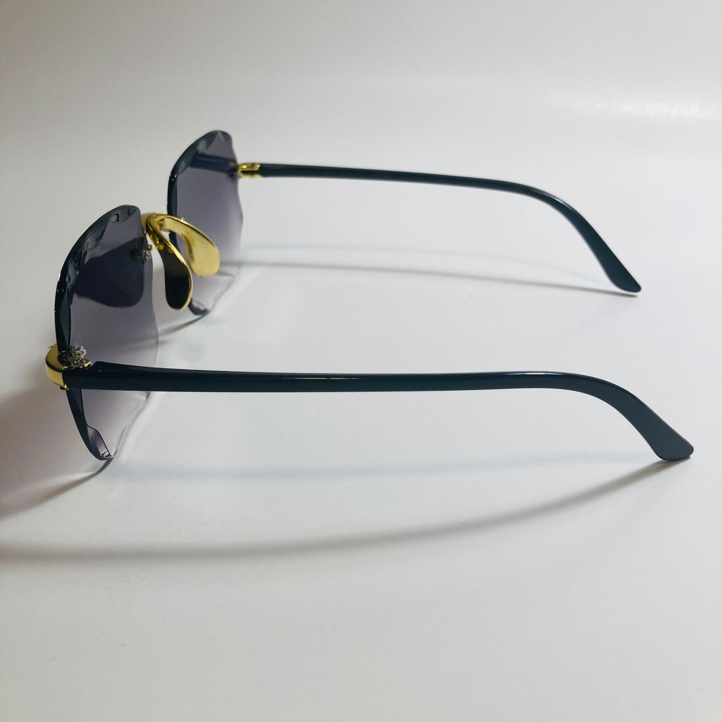 womens rimless gold square oversize sunglasses with black lenses