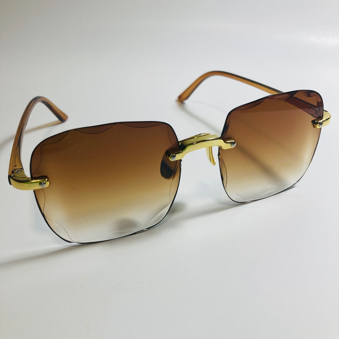 womens rimless gold square oversize sunglasses with brown lenses