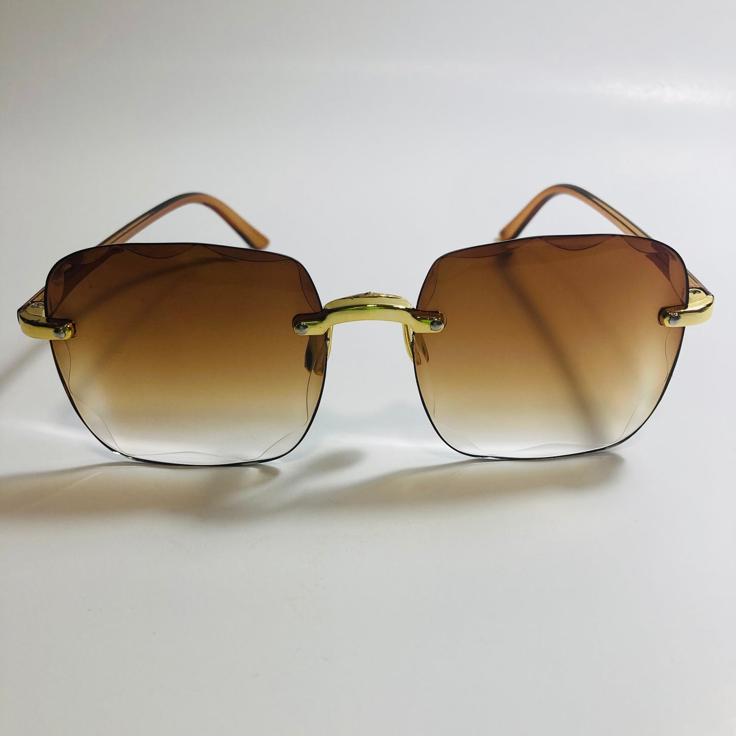womens rimless gold square oversize sunglasses with brown lenses