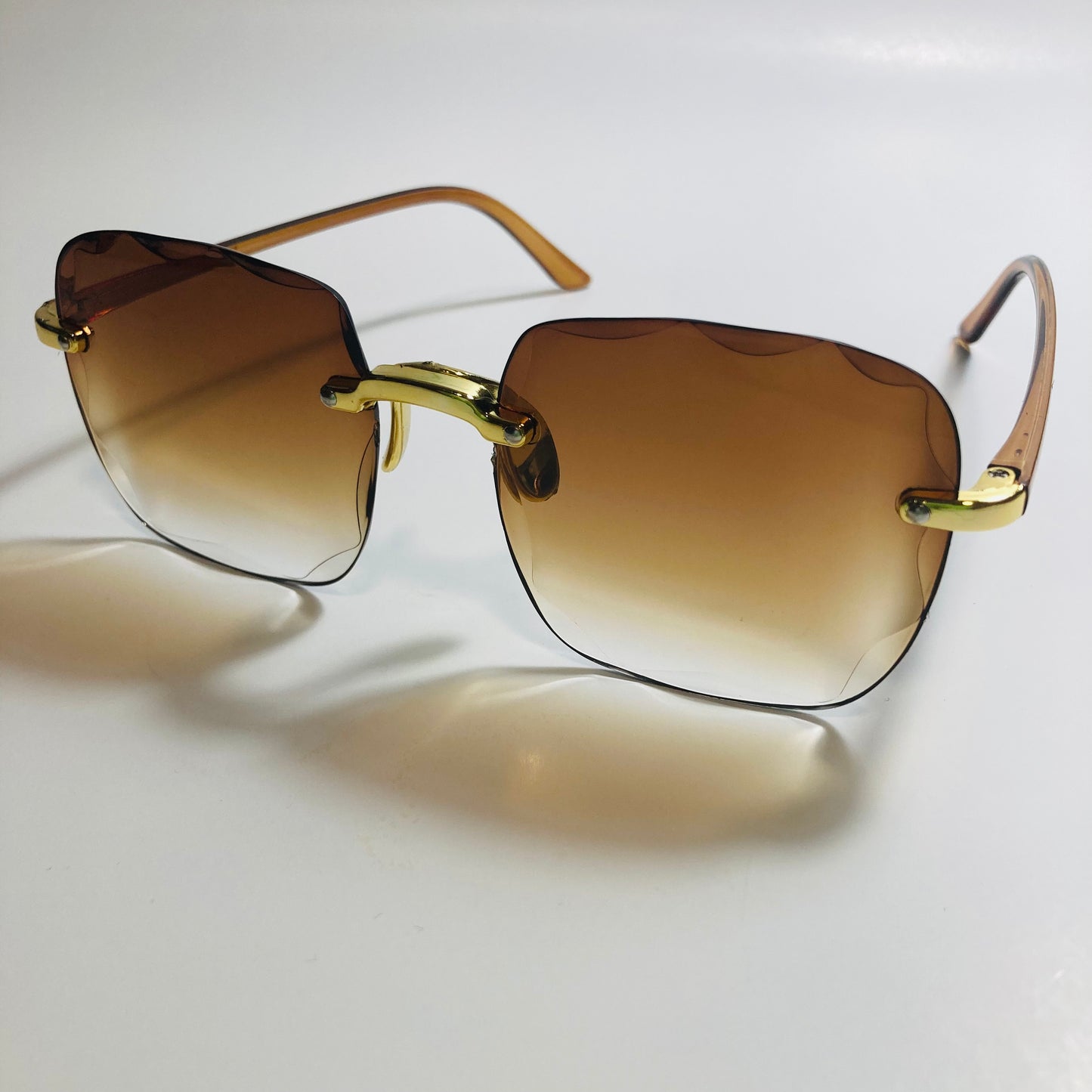 womens rimless gold square oversize sunglasses with brown lenses