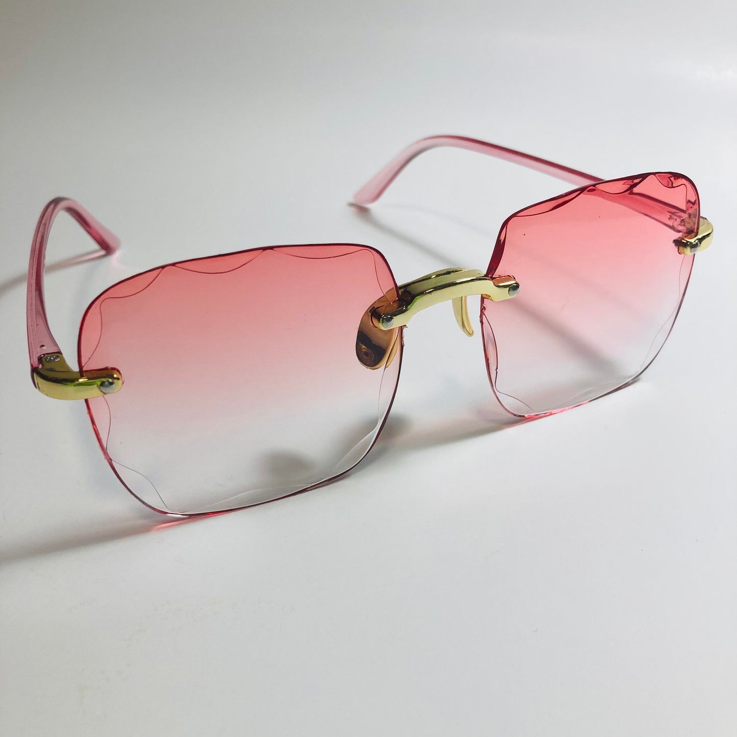 womens rimless gold square oversize sunglasses with pink lenses
