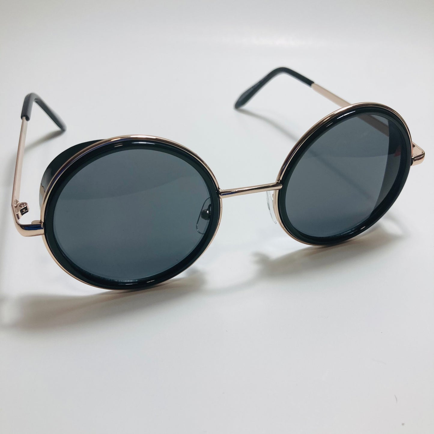 mens and womens gold and black round side shield sunglasses