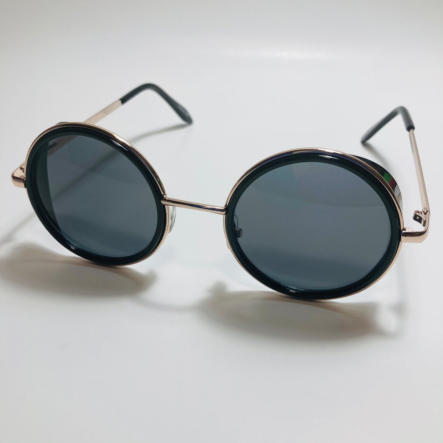 mens and womens gold and black round side shield sunglasses