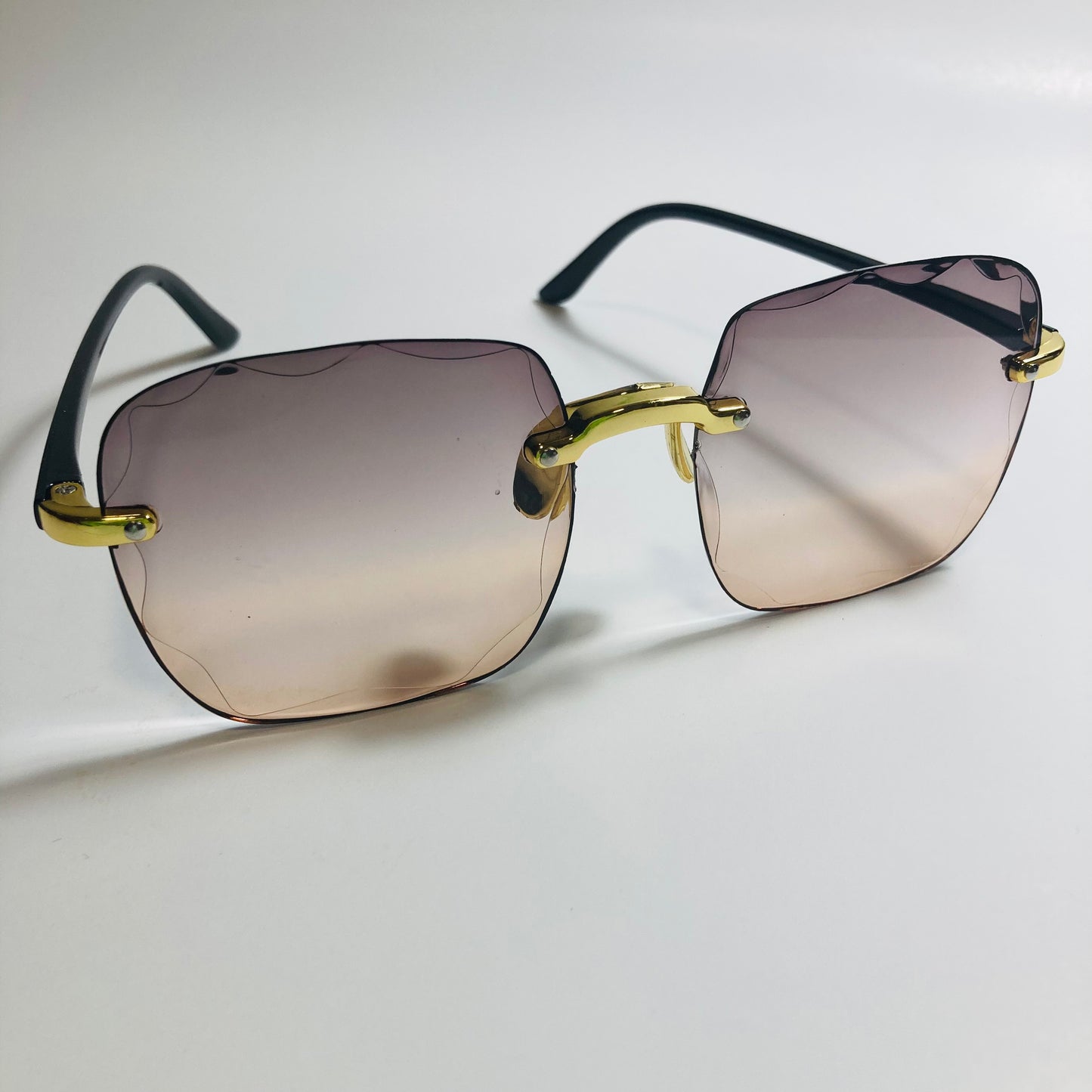 womens rimless gold square oversize sunglasses with black and brown lenses