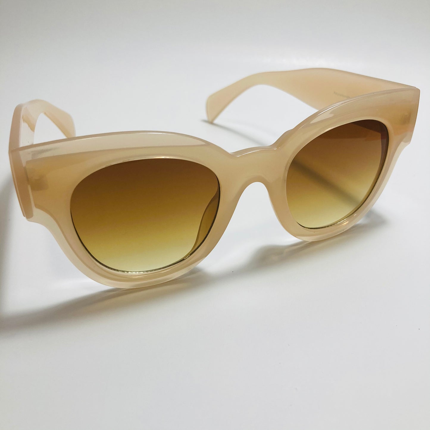 tan and brown womens round oversize sunglasses