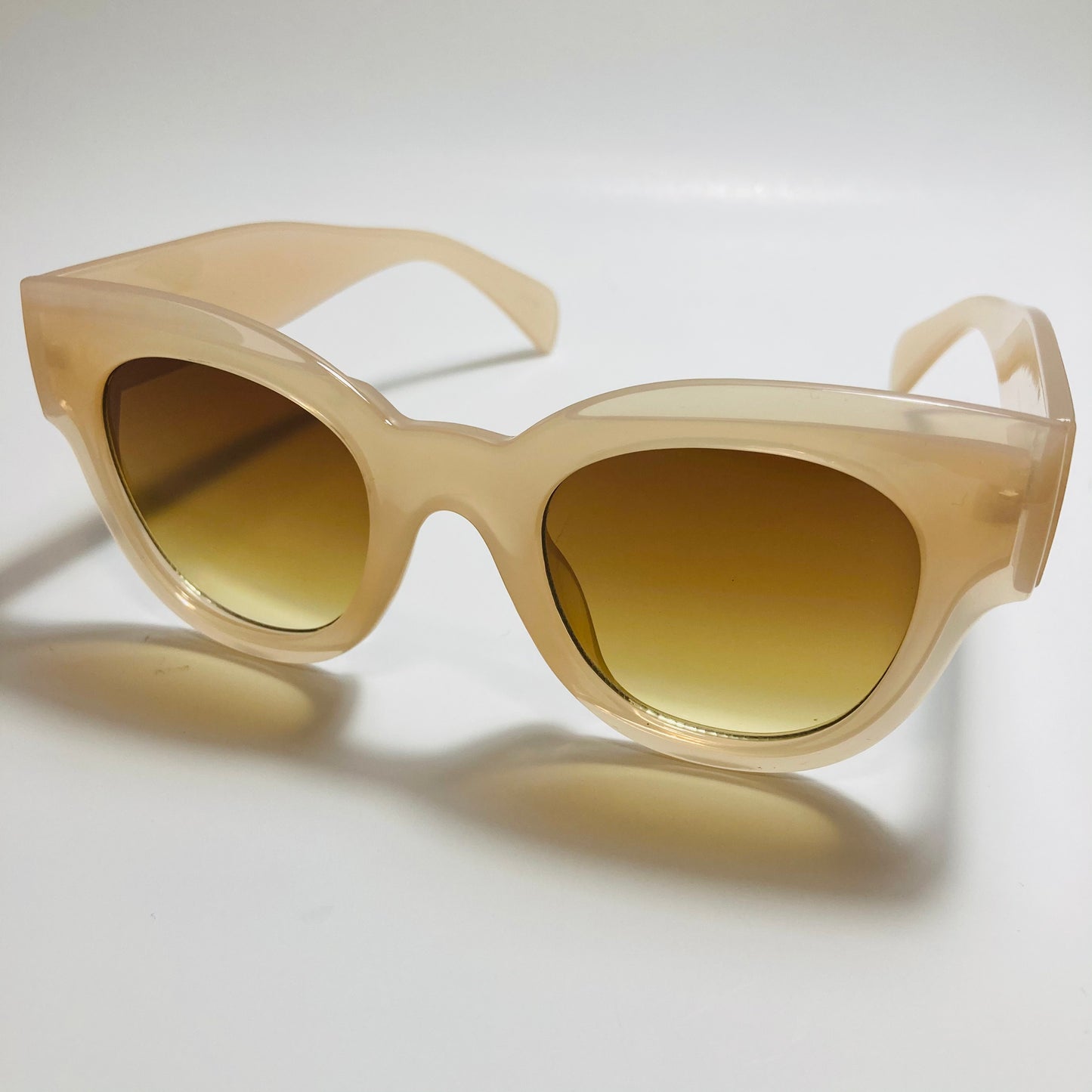 tan and brown womens round oversize sunglasses